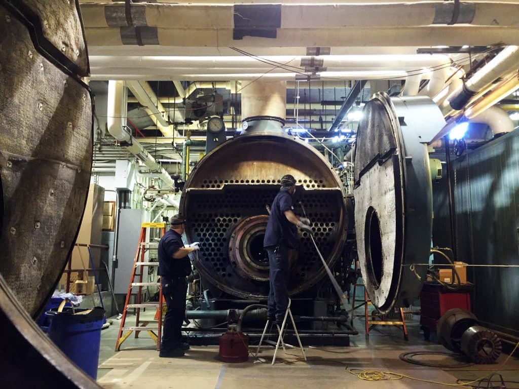 Steam boiler installation inside an industrial facility.
